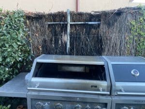 ruined-brush-fence-in-need-of-repair