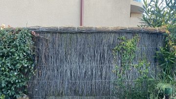 ruined brush fence repair